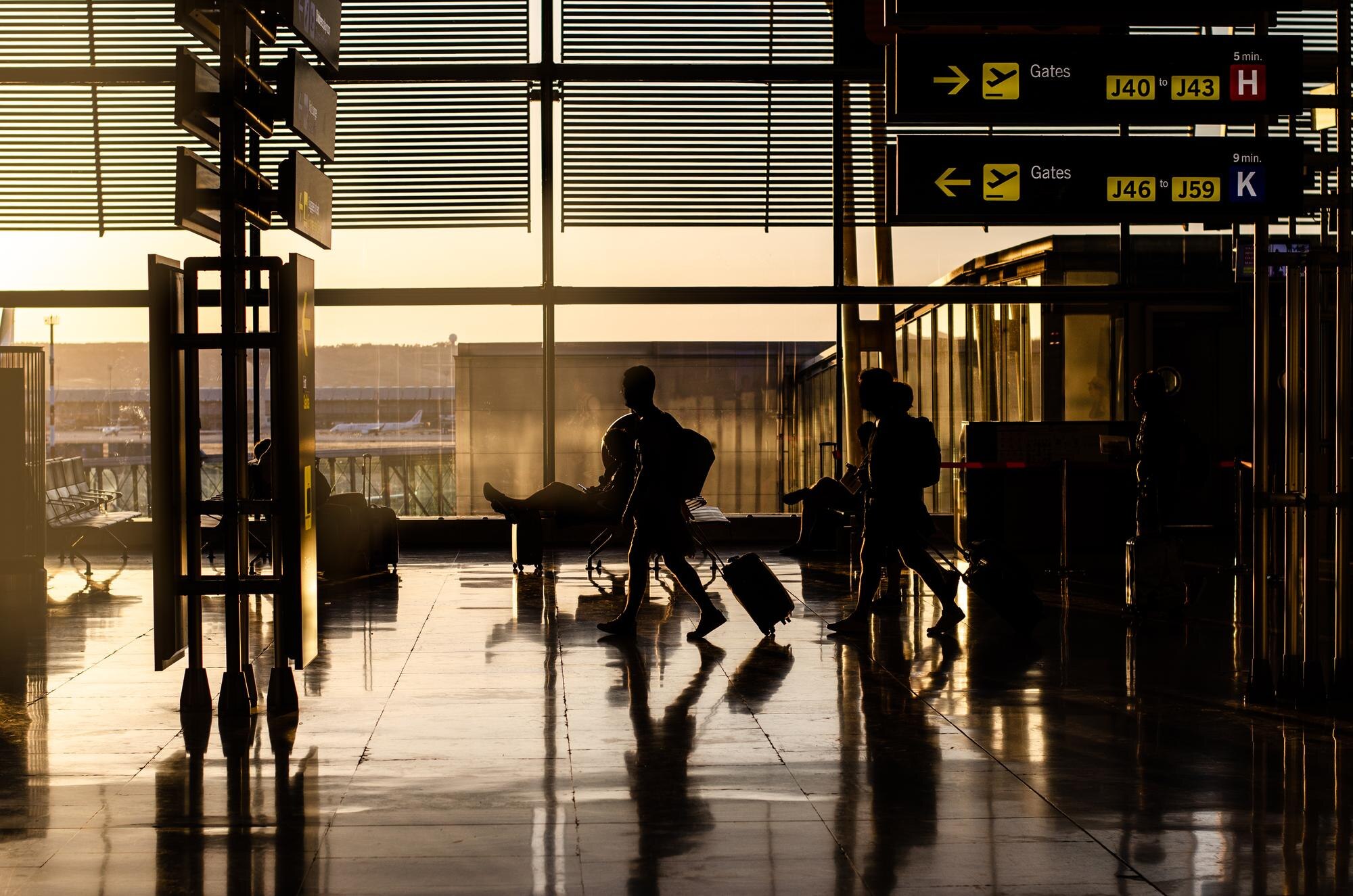 people-walking-inside-airport-terminal_657883-561